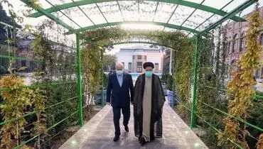 قدم زدن رئیسی و قالیباف در حیاط مجلس