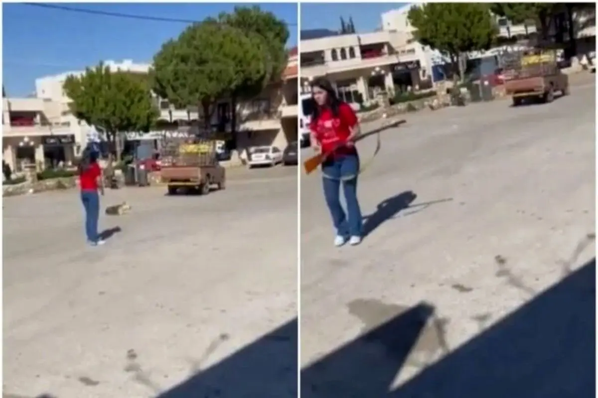 سگ‌کشیِ زن جوان با اسلحه جنجالی شد + فیلم