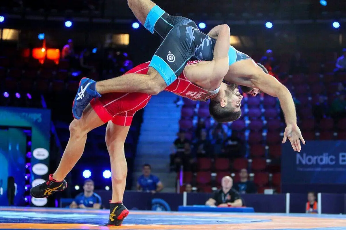 کشتی فرنگی جام تورلیخانوف قزاقستان/ قهرمان المپیک با پیروزی آغاز کرد