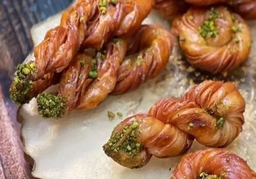 لذیذترین روش تهیه دونات کنجدی بدون نیاز به فر+ فیلم / دونات های کنجدی فقط با سه قلم مواد