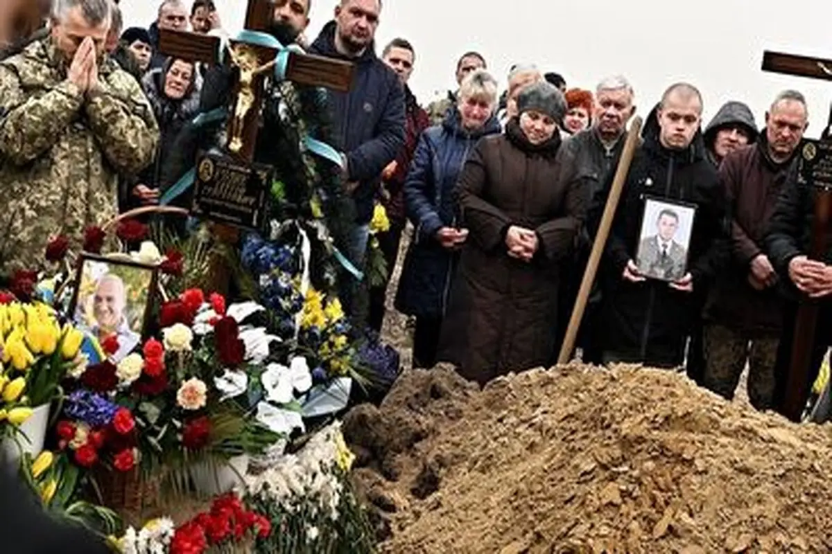 دفن قربانیان جنگ اوکراین در قبرستان قهرمانان+ فیلم