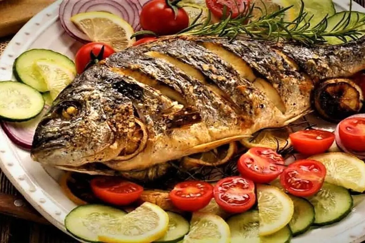 طرز تهیه ماهی قزل آلای تنوری | ترفند نچسبیدن ماهی به سینی فر