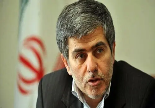 تصویری از شهید فریدون عباسی در کنار رهبر انقلاب

