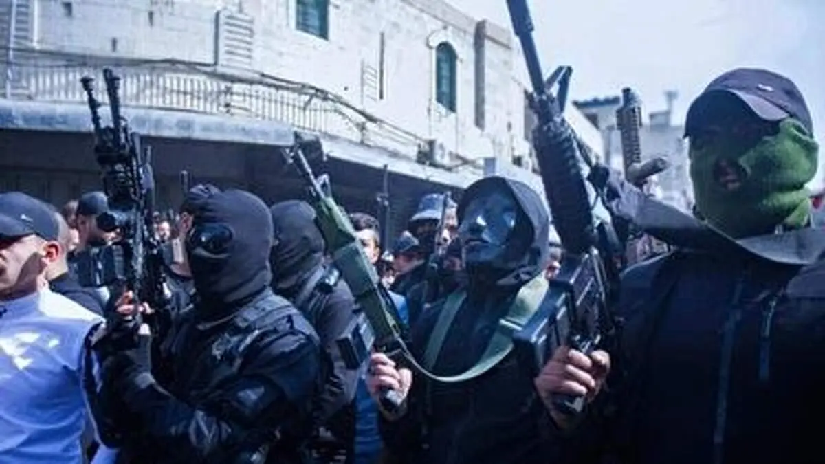 رژه شبه‌ نظامیان مسلح یک گروه فلسطینی+ فیلم