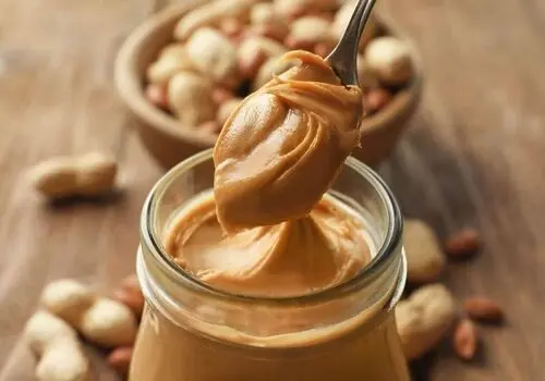 برای تنظیم فشار خون کره بادام زمینی بخورید
