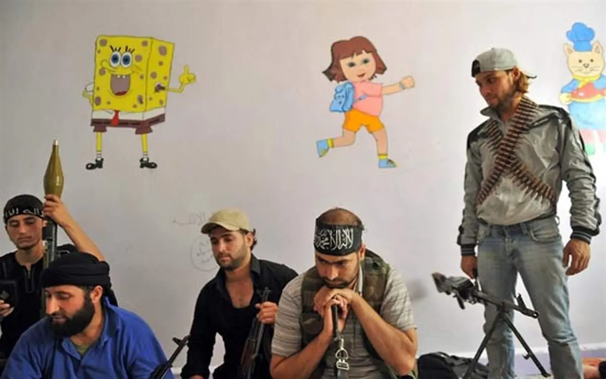 عکس: معارضان سوری در یک مدرسه در حلب