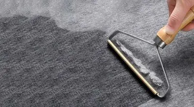 علت پرزدهی فرش‌های تازه و ۵ راهکار مؤثر برای رفع آن