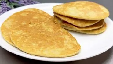 طرز تهیه متفاوت ترین پنکیک موزی با بافتی لطیف در تابه+ فیلم / این پنکیک رژیمی نیازی به آرد و شکر ندارد