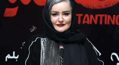 قابی از نعیمه نظام‌دوست و رضا نیکخواه در یک مراسم