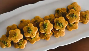 طرز تهیه شیرینی نخودچی یا نان نخودچی ️ویژه عید نوروز+فیلم
