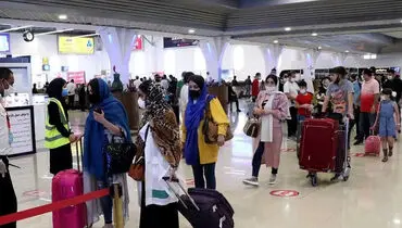 درگیری زن بی حجاب با یک روحانی بر سر حجاب در فرودگاه مهرآباد + فیلم

