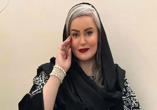 قابی از نعیمه نظام‌دوست و رضا نیکخواه در یک مراسم