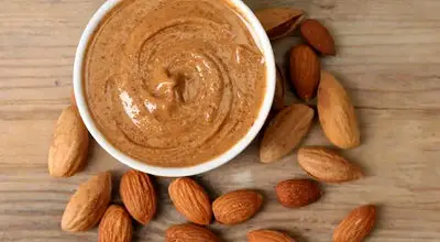 سالم‌ترین انتخاب یا یک باور اشتباه؟ کره بادام درختی زیر ذره‌بین
