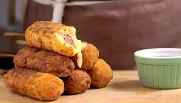 سوسیس شکم‌پر خانگی؛ یک میان‌وعده خوشمزه و آسان+فیلم