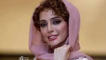 چهرۀ «نگین معتضدی» در 2 سالگی در آغوش پدربزرگش