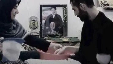 ویدئو | بوسه مادر بر دستان جانباز دهه هشتادی قطع‌عضو